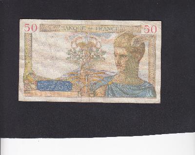 Beschrijving achterzijde: CADUCEUS